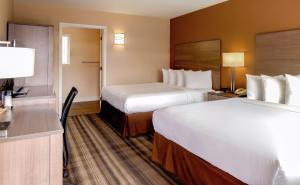 Llit o llits en una habitació de Boulder University Inn