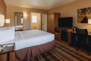 Llit o llits en una habitació de Boulder University Inn
