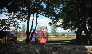 a playground in a park with a play structure at The Waterside Cottages in Nenagh