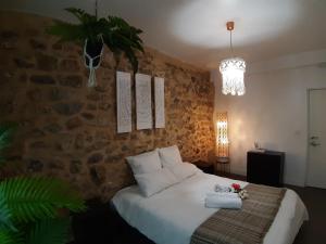 Postel nebo postele na pokoji v ubytování Ananda Beach Rooms