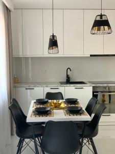 Kuchyňa alebo kuchynka v ubytovaní Apartament Zacisze De LUX