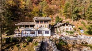 an aerial view of a house in the mountains at Mulìn Turcìn in Coassolo Torinese