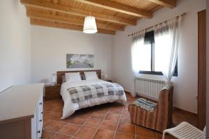 Postel nebo postele na pokoji v ubytování Las Casas de Pecheye