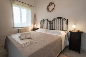 Posteľ alebo postele v izbe v ubytovaní Casa Rosario