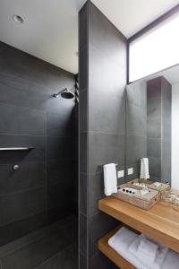 A bathroom at Bangalay Luxury Villas
