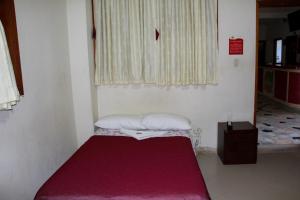 Cama o camas de una habitación en Hotel El Tesoro Del Llano