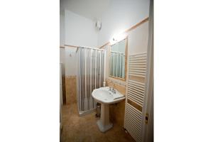 Koupelna v ubytování Le Antiche Mura + 12 fotografií