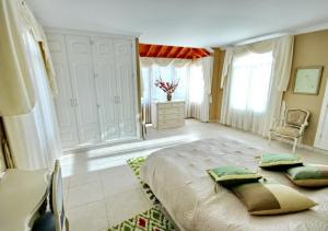 Ένα ή περισσότερα κρεβάτια σε δωμάτιο στο Villa Lemon