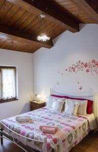 A bed or beds in a room at Il Gladiolo