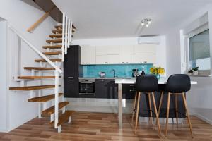 Kuchyň nebo kuchyňský kout v ubytování Apartment AleMar