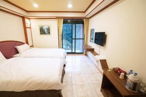 Katil atau katil-katil dalam bilik di Xanadu Hostel