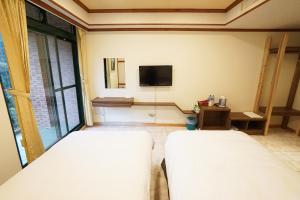 Katil atau katil-katil dalam bilik di Xanadu Hostel