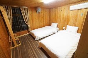 Katil atau katil-katil dalam bilik di Xanadu Hostel