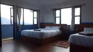 Postel nebo postele na pokoji v ubytování Good Hotel