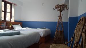 Postel nebo postele na pokoji v ubytování Good Hotel