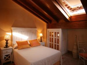 Giường trong phòng chung tại Hotel Posada La Robleda