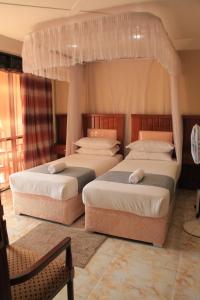 Letto o letti in una camera di Interservice Hotel