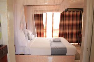Letto o letti in una camera di Interservice Hotel