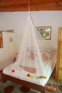 Postel nebo postele na pokoji v ubytování Coco Bay Villa