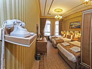 Postel nebo postele na pokoji v ubytování Glamour Classic Hotel Istanbul Sirkeci