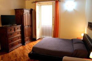Posteľ alebo postele v izbe v ubytovaní Casa Vacanza Pablo Castello