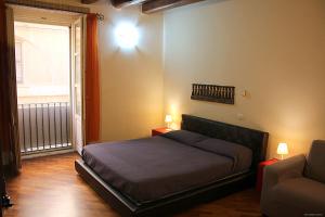 Posteľ alebo postele v izbe v ubytovaní Casa Vacanza Pablo Castello