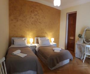 Postel nebo postele na pokoji v ubytování Omsi House