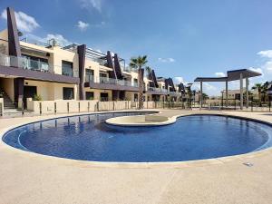 Bazén v ubytovaní Playa Elisa Apartment - Mil Palmeras - 1510 alebo v jeho blízkosti