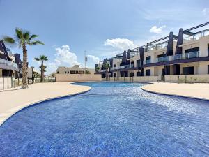 Bazén v ubytovaní Playa Elisa Apartment - Mil Palmeras - 1510 alebo v jeho blízkosti