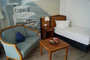 Postel nebo postele na pokoji v ubytování Hotel Novum