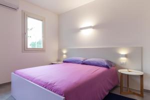 Postel nebo postele na pokoji v ubytování Rose Canine B&B
