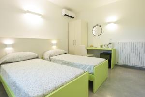 Postel nebo postele na pokoji v ubytování Rose Canine B&B