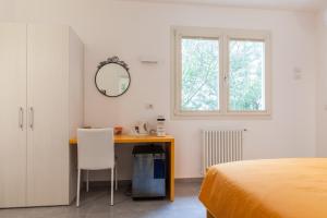 Postel nebo postele na pokoji v ubytování Rose Canine B&B