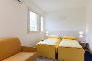 Postel nebo postele na pokoji v ubytování Rose Canine B&B