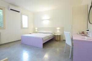 Postel nebo postele na pokoji v ubytování Rose Canine B&B