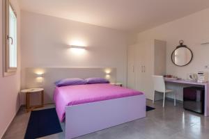 Postel nebo postele na pokoji v ubytování Rose Canine B&B