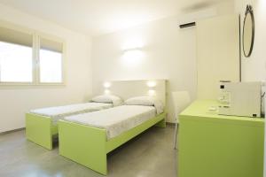 Postel nebo postele na pokoji v ubytování Rose Canine B&B