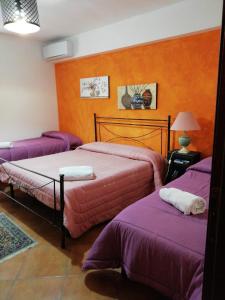Postel nebo postele na pokoji v ubytování Bed and breakfast Agrumi in terrazza
