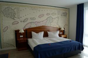 Postel nebo postele na pokoji v ubytování Hotel Novum
