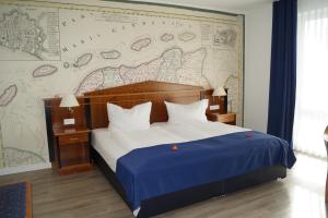 Postel nebo postele na pokoji v ubytování Hotel Novum