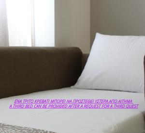 A bed or beds in a room at Aiolos Apartments Suites Ermou 64 Monastiraki Plaka 2nd Floor