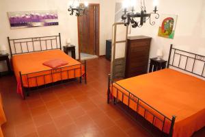 Tempat tidur dalam kamar di B&B Mary Porto Cesareo