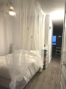 Postel nebo postele na pokoji v ubytování Una ventana al mar
