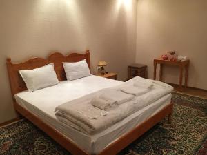 Кровать или кровати в номере Old Bukhara Boutique