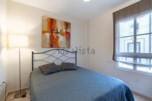 Postel nebo postele na pokoji v ubytování Two bedroom duplex with spectacular ocean view in Costa Adeje