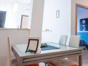 A seating area at Appartamento Il canto della Luna