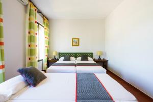 Cama o camas de una habitación en Venta del Alto Hotel las Cumbres by Vivere Stays