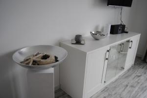 Kuchyň nebo kuchyňský kout v ubytování Dünenrose Apartment 7