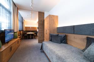Televiisor ja/või meelelahutuskeskus majutusasutuses Hotel Rundeck