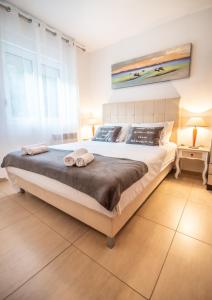 Postel nebo postele na pokoji v ubytování Apartment San Marco + 45 fotografií